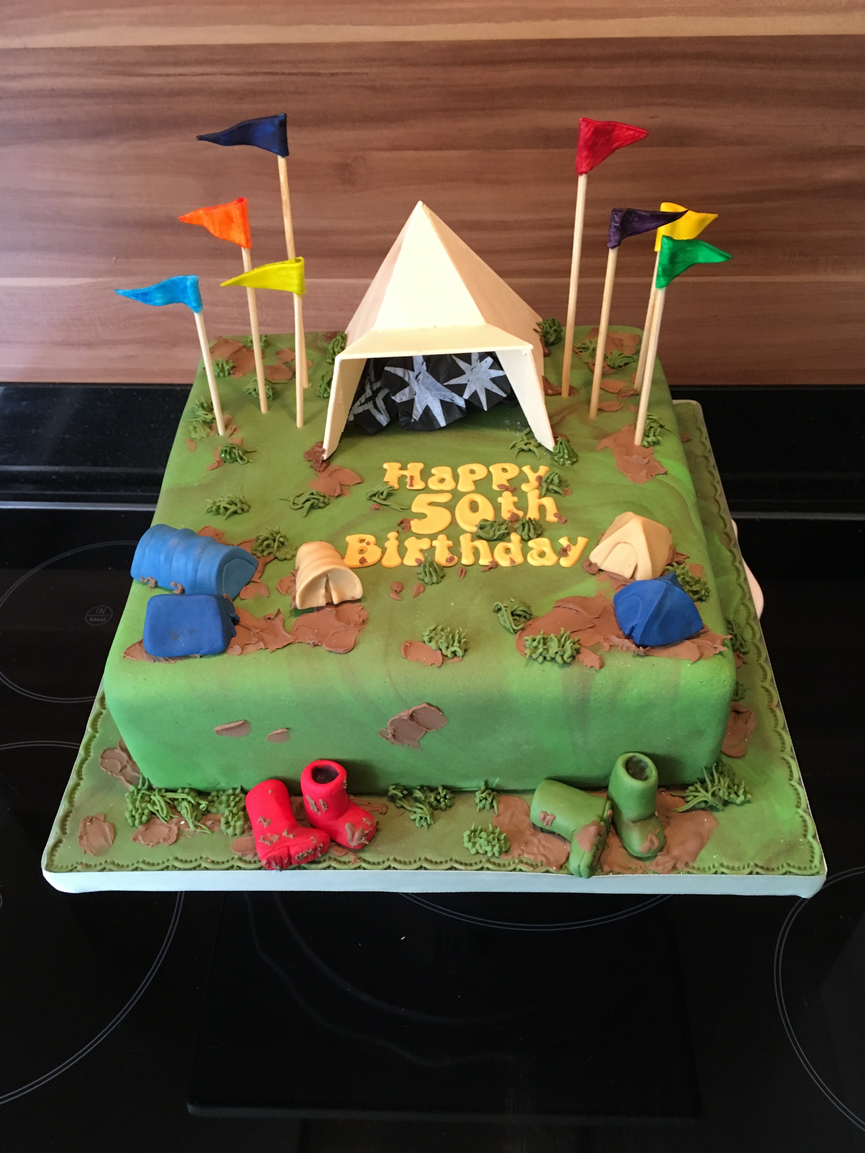 Glastonbury themed cake